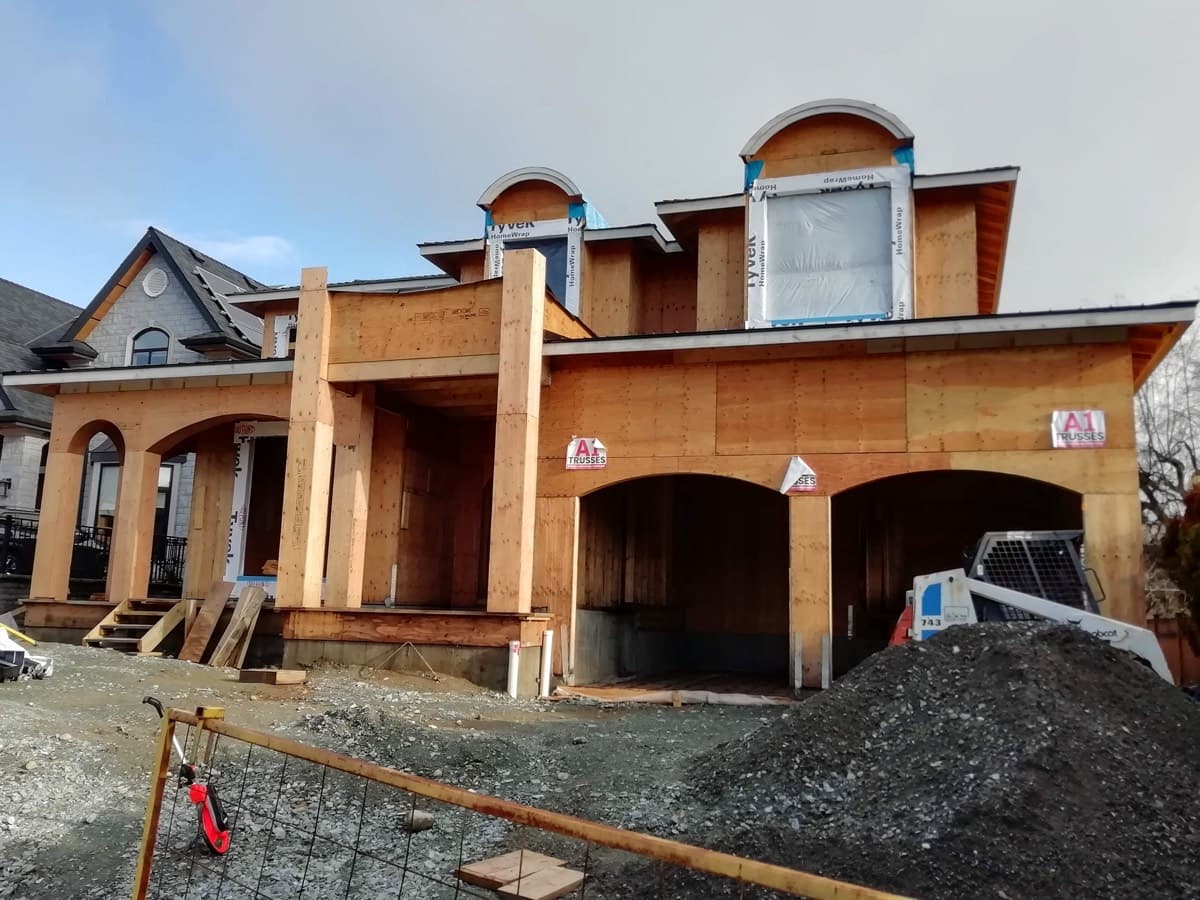 Macintosh custom home framing by Harewood Construction